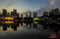 Sunrise reflection at Lake Symphony, KLCC taken with Sony A6000 and Samyang 10mm